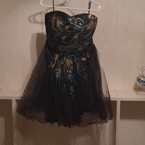 Black dress with peacock feather detailing